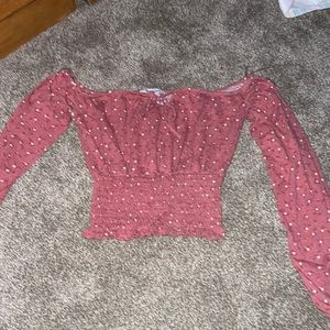 This is a women's crop top/ off the shoulder top.